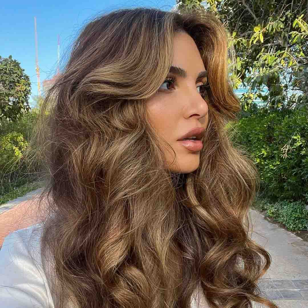 Frisottis et humidité de saison : comment garder des cheveux disciplinés ?